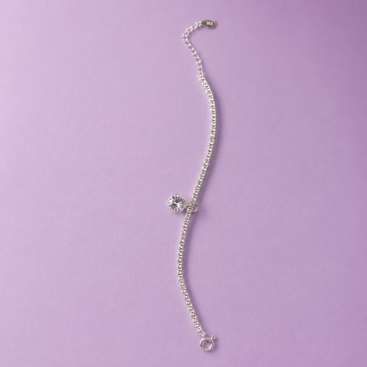 pulsera plateada de diamantito colgante